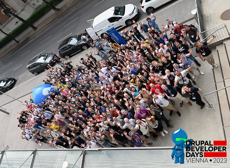 Delegates pose for a group photo at Drupal Developer Days Vienna 2023. Credits: Nico Grienauer/flickr
