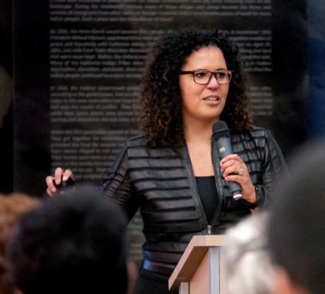 Safiya Umoja Noble giving a lecture. Image via her personal website