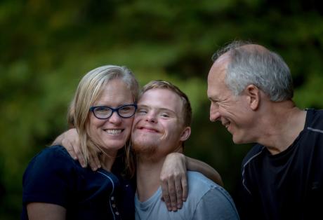 Special needs child with family